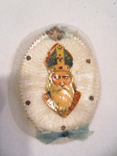 NIKOLAUS AUF GEPRÄGTER PAPE IM NETZ RÜCKSEITIG WACHSKIND BLUMENGIRLANDE