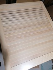 In FOLIE verpackte Sichtschutz Holz