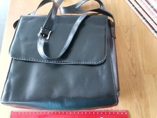 Handtasche schwarz Kunstleder