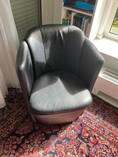 Vier Design Ledersessel, 2 x schwarz, 2 x dunkel-aubergine