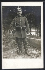 Foto-AK Deutscher Soldat mit Pickelhaube Württemberg und Gewehr 
