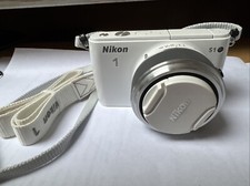 Nikon1 weis mit viel - nikon1,