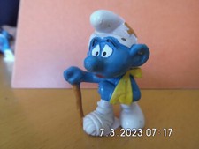 Schlumpf. Verletzter. Schlumpfkatalog IV, Seite 64, Figur 4, gebraucht