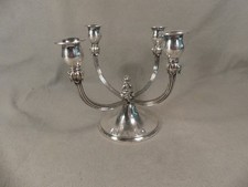 4 armiger Kerzenständer mit Figur versilbert