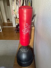 Boxing bag for kicks& punches. water filled base for weight. Approx 150cm tall.