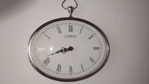 Wanduhr oval 25cm breit - wanduhr,
