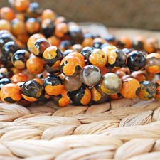 NELLYS  FeuerAchat Achat orange  schwarz facettiert Strang Perlen Edelsteine