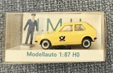 I.M.U 11002 Volkswagen VW Polo I gelb mit Postmann,  in OVP, H0 1:87