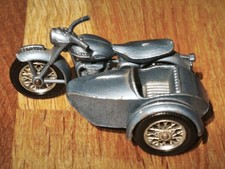 TRIUMPH T110 MOTORCYCLE WITH