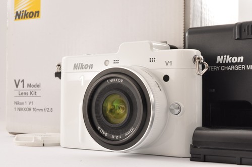 Fast neuwertig nikon - 1, v1