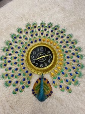 Dekorative Pfauen-Wanduhr in