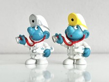 ✅ 2x SCHLUMPF "Arzt“ (20037) Variante Gelb/silber Schleich Peyo W.Germany 
