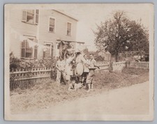 Women and Men with Scarecrow -