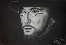 Mann mit Hut und Brille