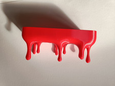 Rotes Tropfregal schmelzendes