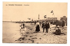 AK Rostock Warnemünde Strandleben Fahnen alte Strandkörbe Leuchtturm