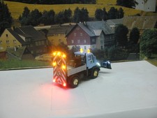 Modellauto HO 1:87 Unimog mit Warnschild mit Super smd Led Beleuchtung