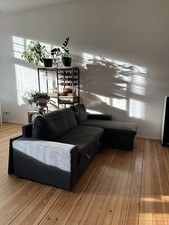 Graues Eckschlafsofa mit