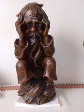 Wachsfigur sitz. alter Mann Wurzelsepp