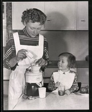 Fotografie junge Hausfrau mit