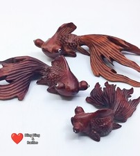 Geschnitzte Holzfische 3st. -
