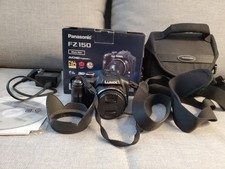 Panasonic LUMIX DMC-FZ150 12.1 MP Digitalkamera - Schwarz- 24 x Zoom, 