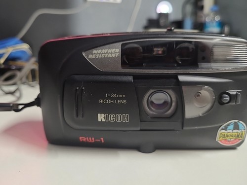 Ricoh 1 - rw-,