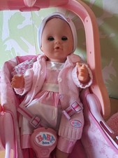 Baby Born Tragesitz rosa mit Babypuppe 36 cm Schlafaugen und Stricksachen