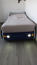 Blaues Rennwagenbett mit Beleuchtung inkl. Rost 90 x 200 cm