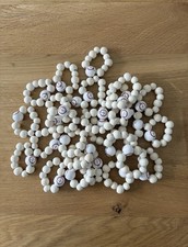 30 Serviettenringe aus Holzperlen