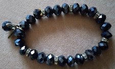 Armband - Kügelchen in dunkelgrau glänzend  von Loculi - guter Zustand!