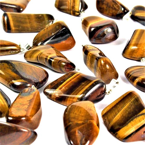 Premium tigerauge trommelstein - premium,