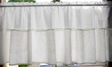 Scheibengardine goldfarben