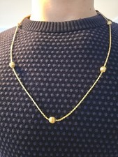 Goldkette mit 7 Gold-Kugeln