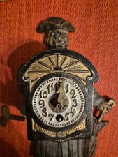 Antike figur mit uhr jhd - uhr, 19.