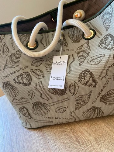 Credi tasche - l.,