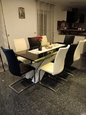 Glastisch bis zur 2,20 ausziehbar mit 8Lederstuhle 