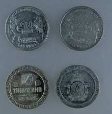 Las Vegas = 4 alte diverse 1 Dollar Token für Geldspielautomaten (111184)