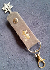 Schlüsselanhänger aus Filz, nagelneu mit Engel und baumelnder Schneeflocke