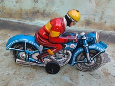 Blechspielzeug-Motorrad zum