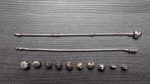 Pandora armband mit 9 - 2x,