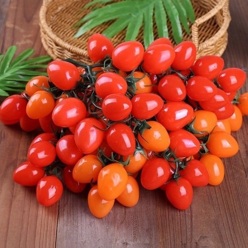 Gefälschte kleine tomate - kleine,