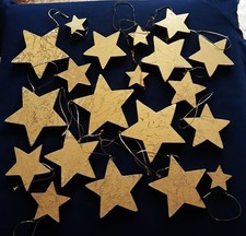 20 hochw. Holz Deko Sterne  von TCM,  handbemalt in  Blattgold-Optik sgt. Zust.