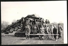 Fotografie Raupen-Schlepper / Kettenschlepper mit Eimerkette Bodenfräse, Baumas 
