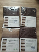 Vier fertige Gardinen mit