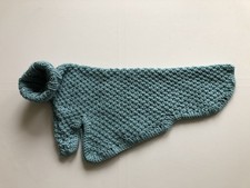Warmer,  handgestrickter
