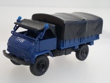 Unimog Pritsche Plane THW blau
