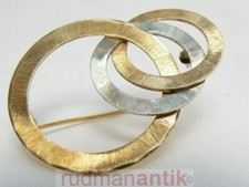 Brosche gelbgold und - und, weissgold
