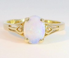 Ring mit einem Opal aus 333er Gelbgold 8K Ringgröße 52