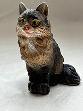 sitzende Katze schwarz-braun